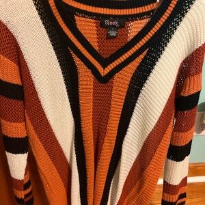 Sold on Mercari - Sleek Striped Knit Sweater